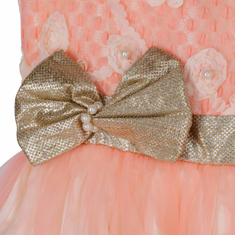 Lacy peach gown with golden bow