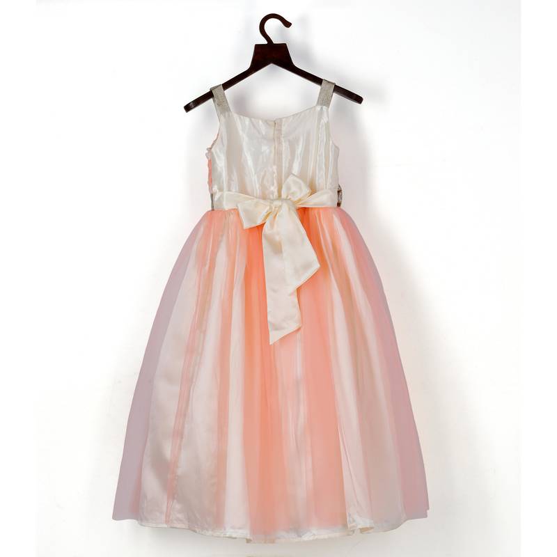 Lacy peach gown with golden bow