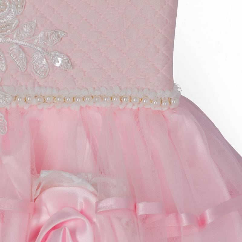 Pink Cow girls party gown embellished with hand made flowers