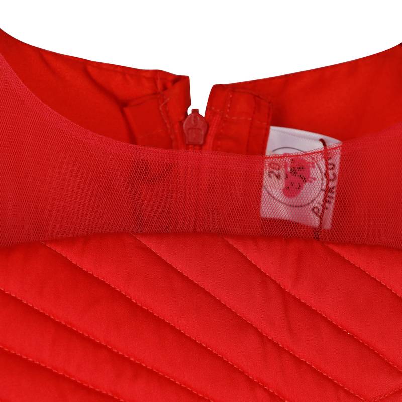 Red gown with flower on waist