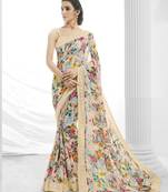 Cream printed georgette saree with blouse