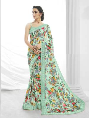 Green printed georgette saree with blouse 1