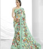 Green printed georgette saree with blouse