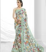 Light green printed georgette saree with blouse