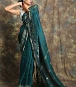 Green woven linen saree with blouse