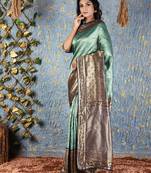 Teal woven silk blend saree with blouse