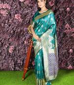 Teal woven silk saree with blouse