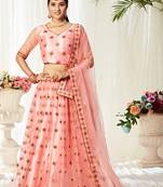 Peach embroidered net semi stitched lehenga