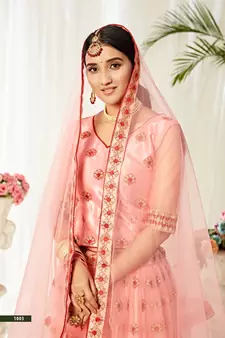 Peach embroidered net semi stitched lehenga