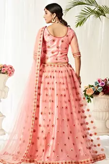 Peach embroidered net semi stitched lehenga