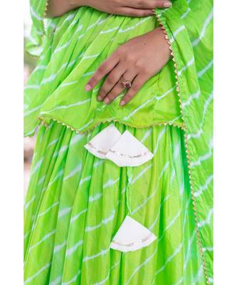 green pure hand tie and die lehenga with bijiya and white tassels 4