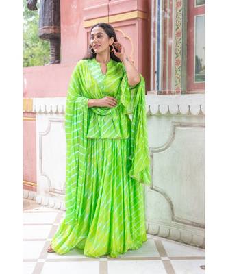 green pure hand tie and die lehenga with bijiya and white tassels 7