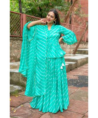 green pure hand tie and die lehenga with bijiya and white tassels 1
