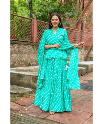 green pure hand tie and die lehenga with bijiya and white tassels 3