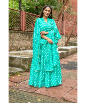 green pure hand tie and die lehenga with bijiya and white tassels 4