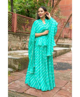 green pure hand tie and die lehenga with bijiya and white tassels 5