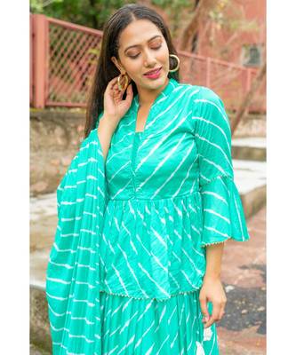 green pure hand tie and die lehenga with bijiya and white tassels 8