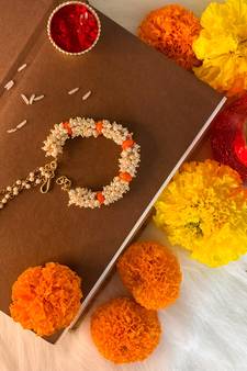 Gold Plated Hanging Pearl Beaded Lumba Rakhi for Bhabhi