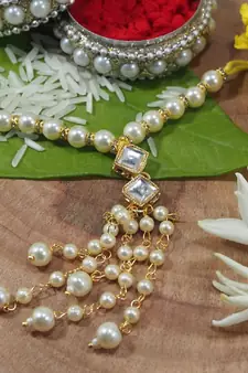 Gold Plated Hanging Kundan Studded Pearl Lumba Rakhi for Bhabhi 