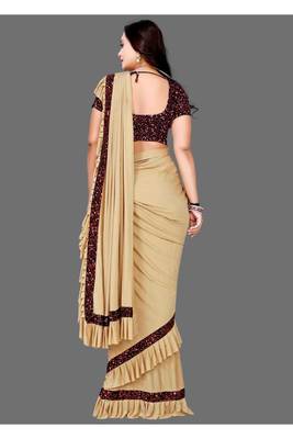 Beige plain lycra saree with blouse 3