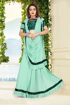 Teal Green  Knitted lycra  saree with readymade blouse 1