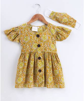 yellow cotton printed stitched   frock 1