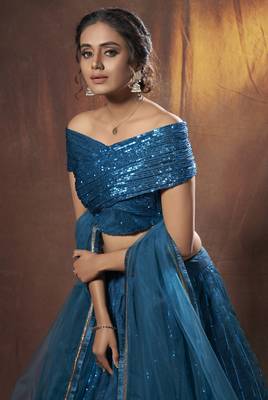 Dark-green embroidered net semi stitched lehenga 2