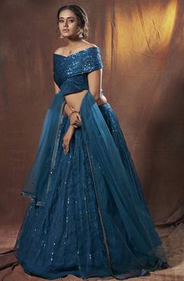 Dark-green embroidered net semi stitched lehenga 3