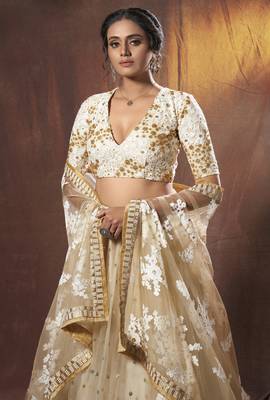 Beige embroidered net semi stitched Pary wear lehenga 3
