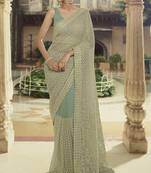 Green embroidered net saree with blouse