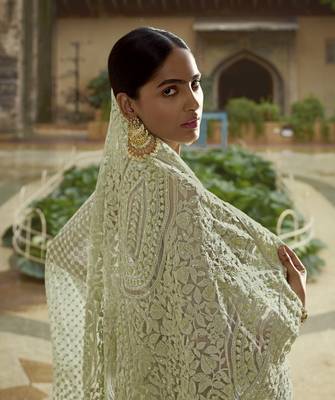 Green embroidered net saree with blouse 4
