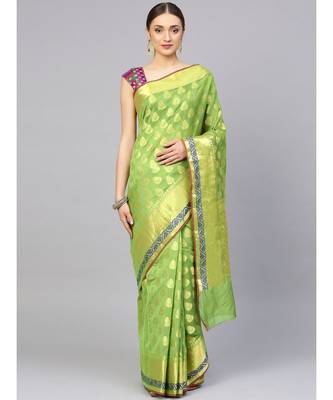 Green woven art silk saree with blouse 1