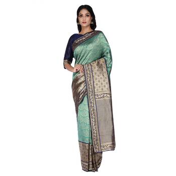 Teal woven silk blend saree with blouse 3