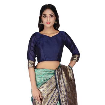 Teal woven silk blend saree with blouse 5