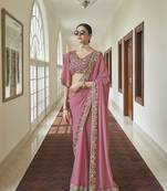 Pink embroidered georgette saree with blouse