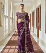 Purple embroidered georgette saree with blouse