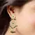 Kundan Studded Drop Jhumka Earrings
