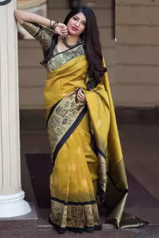Mustard woven Banarasi silk blend saree with blouse