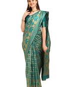Turquoise printed banarasi silk saree with blouse