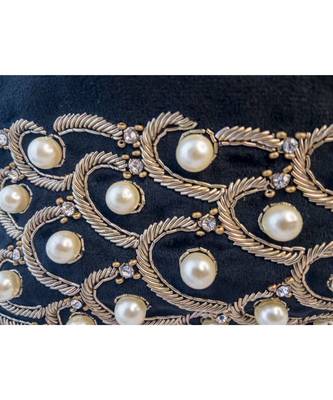 Sea Shell Design Potli Bag on a Royal Black Velvet 4