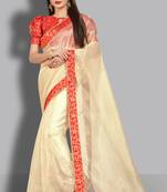 Cream embroidered organza saree with blouse