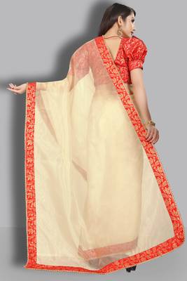 Cream embroidered organza saree with blouse 4
