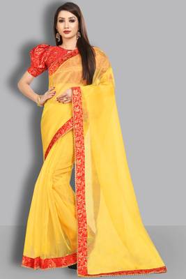 Yellow embroidered organza saree with blouse 1