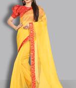 Yellow embroidered organza saree with blouse