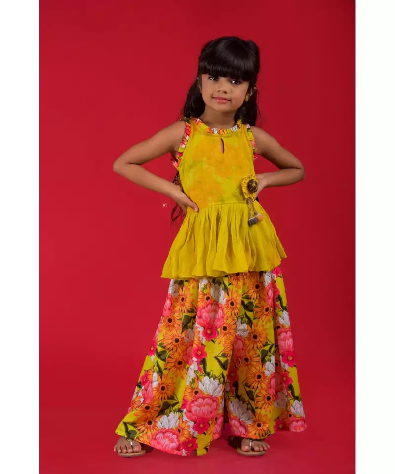 Peplum top with back tie ups and floral print palazzo