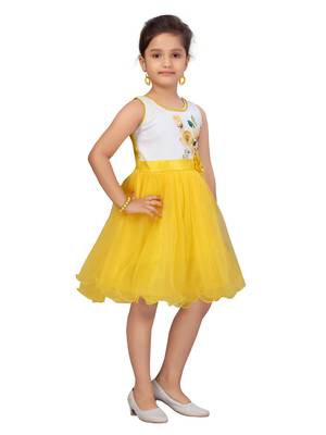 Yellow plain net kids-frocks 2