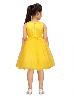 Yellow plain net kids-frocks 4