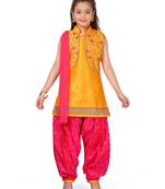 Yellow plain silk salwar suit