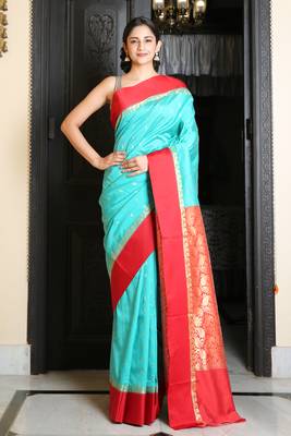 Turquoise woven silk blend saree with blouse 1