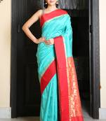 Turquoise woven silk blend saree with blouse